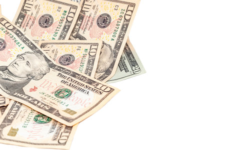 Close-up banknotes of 20 and 10 US dollars, top view. Cash exchange currency, business investment,...
