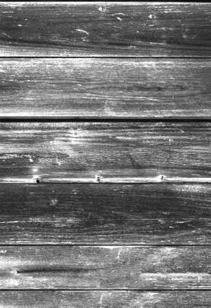 background from old dry cracked wood closeupの写真素材