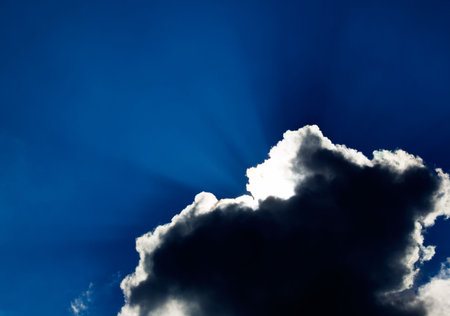 The sun closed by rain clouds.の写真素材