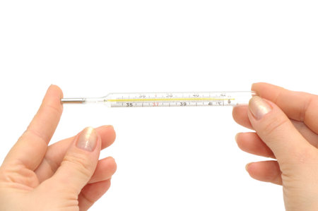 thermometer in hands of the woman