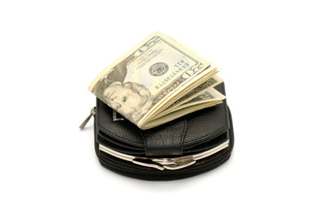 Money and a purse isolated on a white background