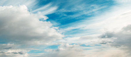 white clouds on a background of the blue sky                                     の写真素材