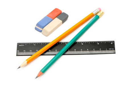 Pencils, eraser and ruler on a white background      