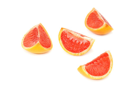 cut grapefruit isolated on whiteの写真素材