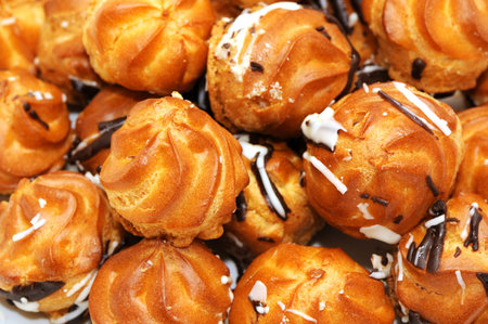pastry filled with custard on white background      