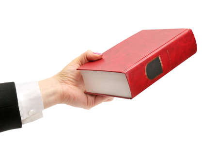 book in hand isolated on a white                                    の写真素材