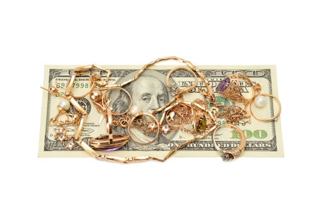 Gold ornaments and dollars isolated on a white background                                    の写真素材
