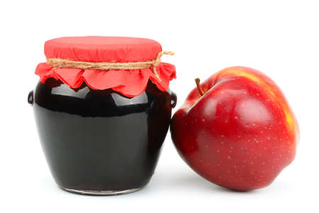 Red apple and pot of jam isolated on white background.                                    の写真素材
