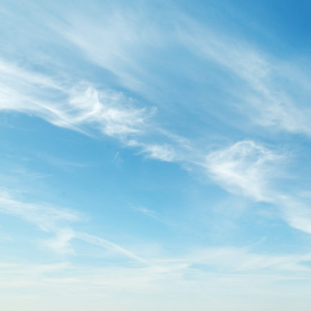 white clouds on blue background