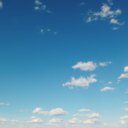 white clouds on blue background
