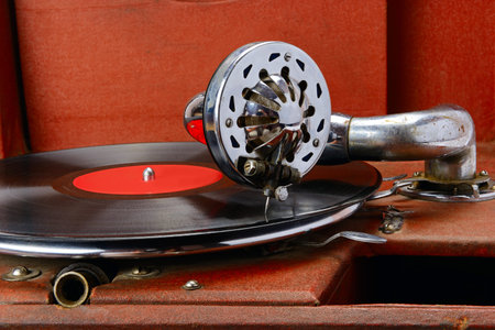 Vintage gramophone with vinyl disc. Close-up.