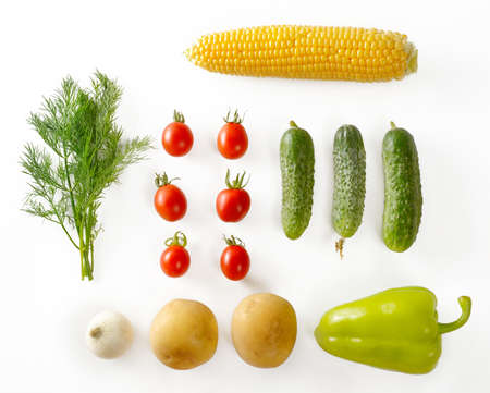 Eco-friendly products from garden. Carrots, onions, potatoes, dill, corn, pepper. Top view isolated vegetables. Healthy food.の写真素材