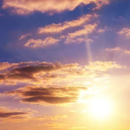beautiful bright sunset in blue sky