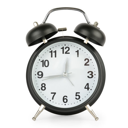 Big black alarm clock in retro style isolated on white background.
