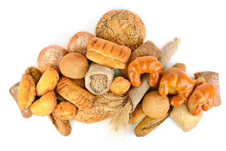 Bread products from wheat and rye flour isolated on white background. Top view