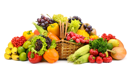 Healthy fresh vegetables and fruits in willow basket isolated on white background. Copy spaceの写真素材