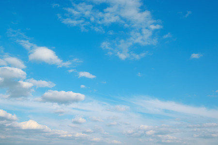 White cirrus clouds on beautiful bright blue sky.の写真素材
