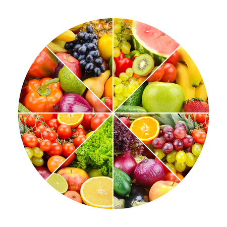 Bright fruits and vegetables in round frame on white background.の写真素材