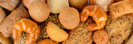 Bread, buns, croissants and other baked goods. Top view.