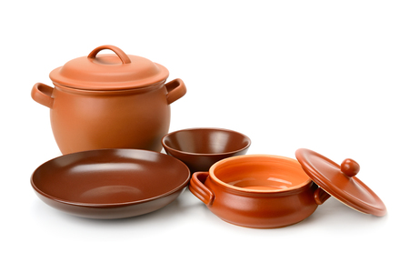 Clay pots, cup, bowls isolated on whiteの写真素材