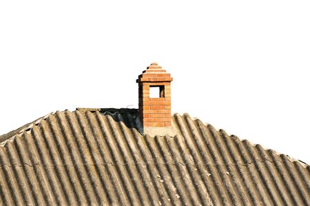 Old building with brick chimney covered slateの写真素材