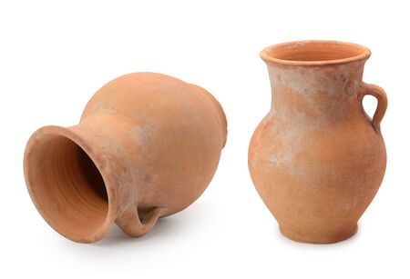 Old handmade clay jugs isolated on white background.の写真素材