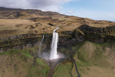 Seljalandsfoss waterfall in Iceland in springtime. powerful image. aerial image horizontal.の写真素材