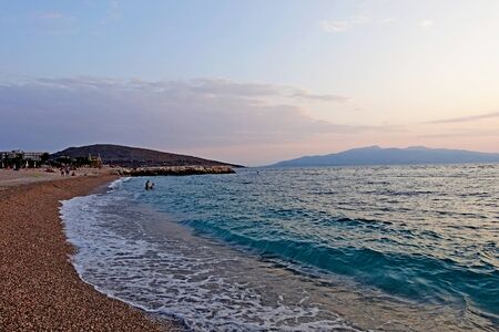 Aegean beach in Saranda Albania overlooking the Greek island of Corfuの写真素材