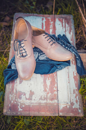 Women's shoes are painted on old blackboardの写真素材