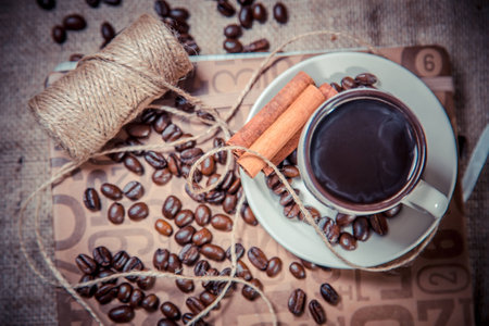 cup of black coffee on a notebook, coffeeの写真素材