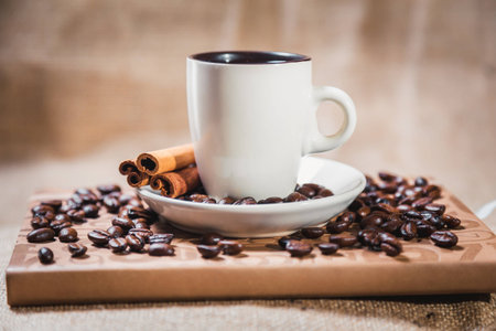 cup of black coffee on a notebook, coffee