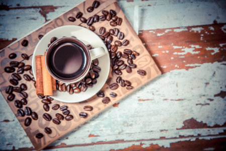 cup of black coffee on a notebook, coffeeの写真素材