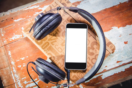 Headphones and phone vintage photos, listen to musicの写真素材