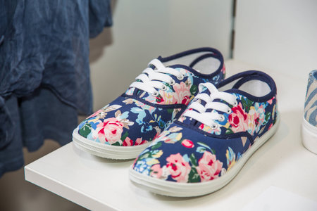 Colorful women shoes on the shelf in the store