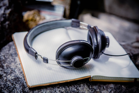 Playlist, headphones and notebook natureの写真素材