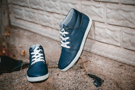 Men's shoes, sneakers on nature, beauty fashionの写真素材
