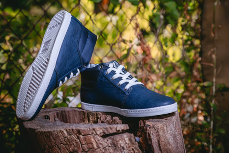 Men's shoes, sneakers on nature, beauty fashionの写真素材