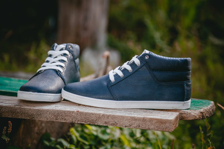 Men's shoes, sneakers on nature, beauty fashion