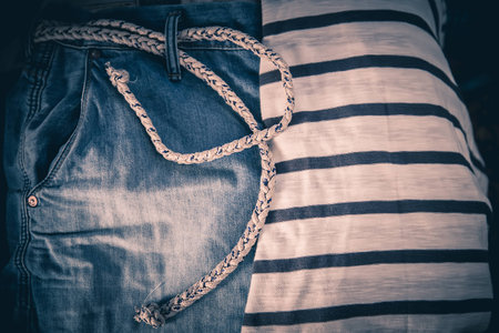 Clothing background, jeans and a striped jacket fashionの写真素材