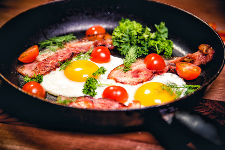 Scrambled eggs with bacon delicious breakfast aの写真素材