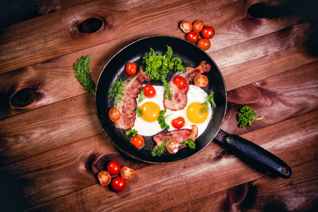 Scrambled eggs with bacon delicious breakfast aの写真素材