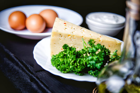 ingredients for cooking scrambled eggs with cheese, the restaurant kitchenの写真素材