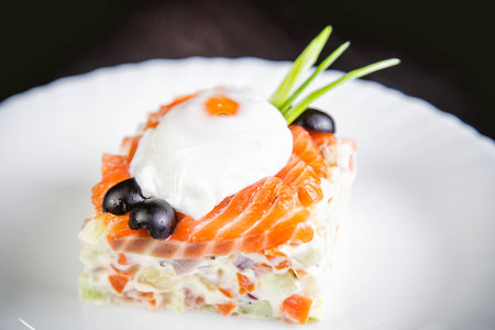 salad with salmon and poached egg, a tasty dishの写真素材