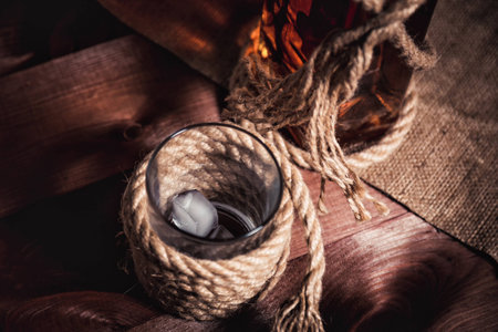 whiskey aged elite alcohol on wooden backgroundの写真素材