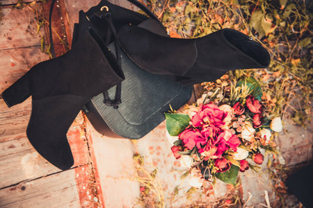 black suede boots and female bag autumnの写真素材