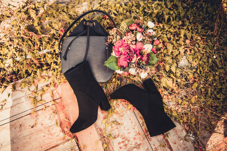 black suede boots and female bag autumnの写真素材