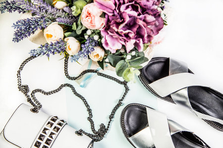 White mandala handbag and flowersの写真素材