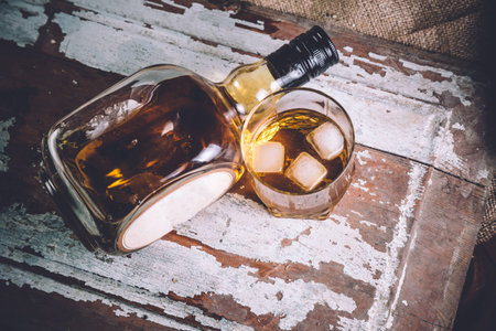 whiskey in an old bottle, wild westの写真素材