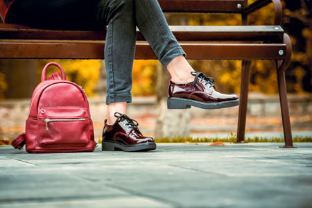 red patent shoes, female autumn lookの写真素材