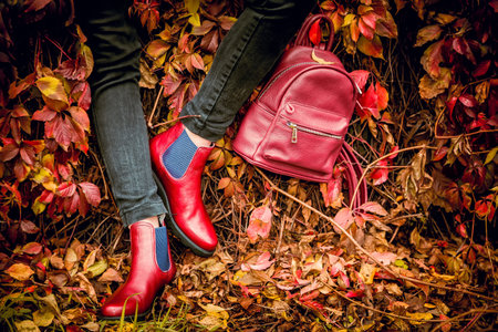 red leather boots, female autumn lookの写真素材